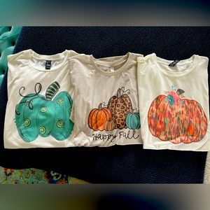 Three short sleeve boutique t-shirts. SOLD